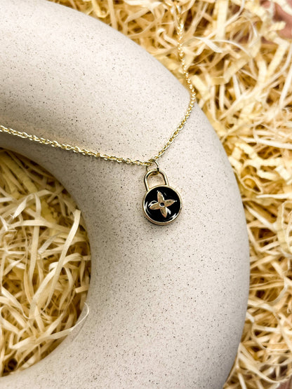 Locked Petal Enamel Golden Necklace & Earrings: Black